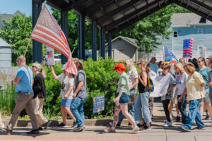 Good Neighbors gather: Rally features speakers, song and spirit
